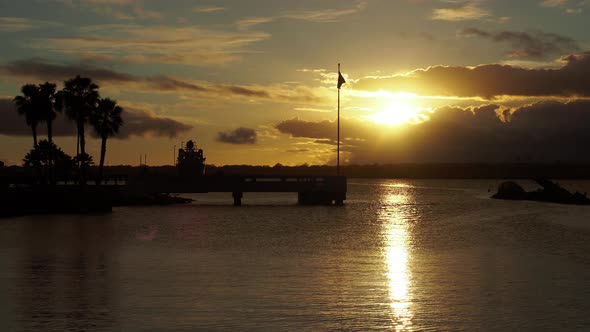 Sunset over the USS Utah Memorial in Pearl Harbor Hawaii.