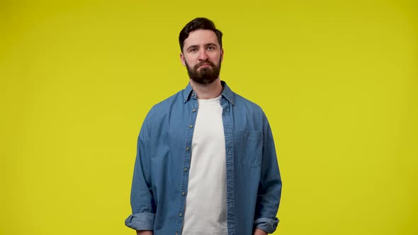 A Man Enthusiastically Shows a Thumb Up with Both Hands