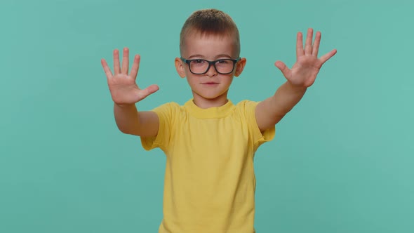 Toddler Children Boy Say No Hold Palm Folded Crossed Hands in Stop Gesture Prohibited Access Danger