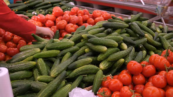 Fresh tomato and cucumbers at grocery store