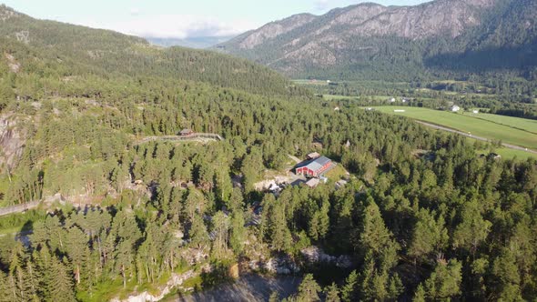 Aerial overview of norwegian zoo and bear park Bjorneparken - High altitude evening aerial showing p