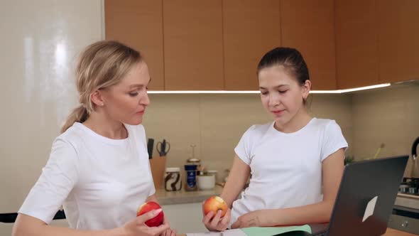 Caring Mom Babysitter Teacher Helping Kid Daughter with Homework Family Education Together