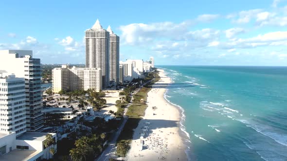 People On Sandy Beachfront In Island City Resort In Mid-Beach Area In Miami Beach, Florida, USA. - T