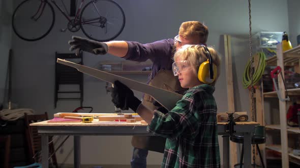 Slow Motion, Boy Plays with a Wooden Machine Gun 