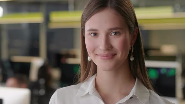 Front View of Beautiful Young Woman Professional Wearing White Shirt