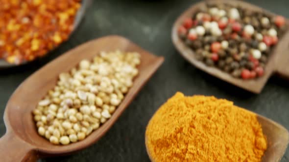 Various type of spices in spoon 4k