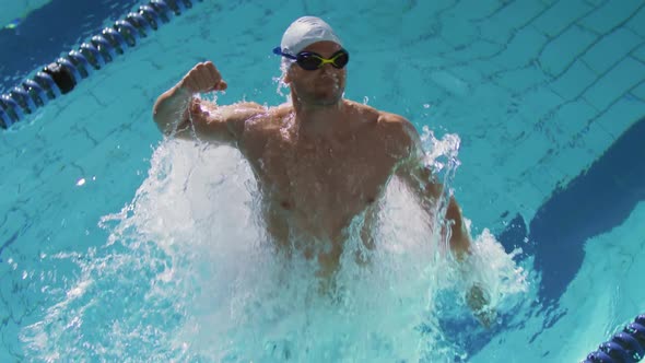 Swimmer training in a swimming pool