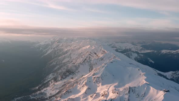 Snowy Slopes of Roza Khutor and Alpia Resorts at Aibga Ridge