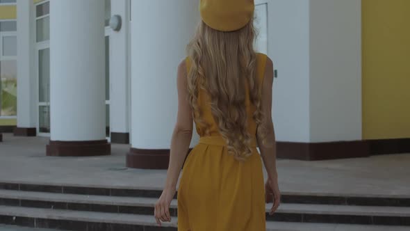 Confident Stylish Woman Walking on Street