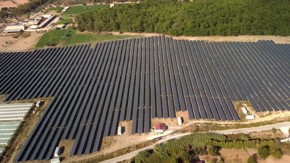 Aerial View of a Solar Farm on the Green Field