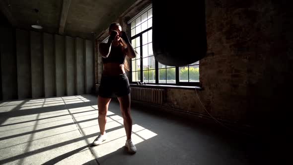 Alone Woman Is Training Strikes in Boxing Gym, Self-training To Fight