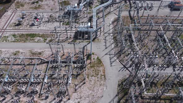 Aerial view of the grid of high voltage power lines and wires.