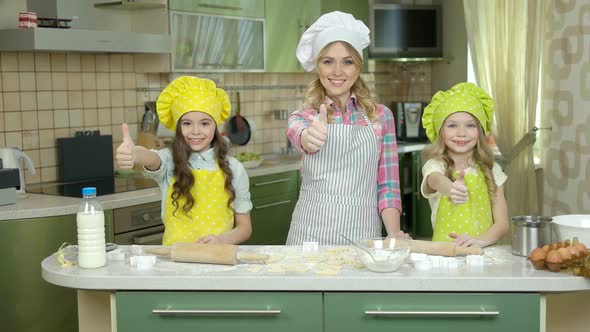 Woman and Children, Thumbs Up.