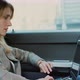 Businesswoman Using Laptop Computer in the Car Using Modern Technology - VideoHive Item for Sale