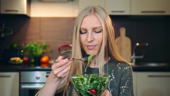Glad Woman Eating Healthy Salad
