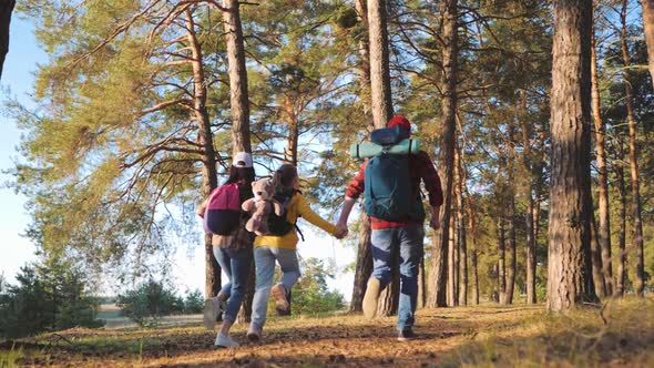 Happy Family are Running on Hike Trip