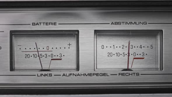 Analog VU Meters on Silver Colored Stereo Tape Recorder Arrow Indicators