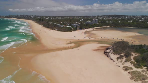 Aerial drone view of beach at Currimundi Lake, Caloundra, Sunshine Coast, Queensland, Australia