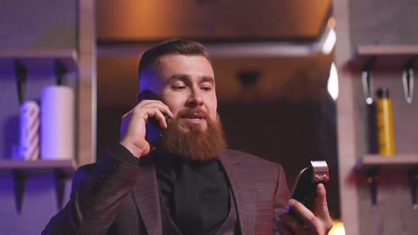 Male Barber Shop Owner Sits Feel Himself Superior Indoors