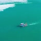 Fishing Boat Floating on Ocean Waves Near Shore - VideoHive Item for Sale