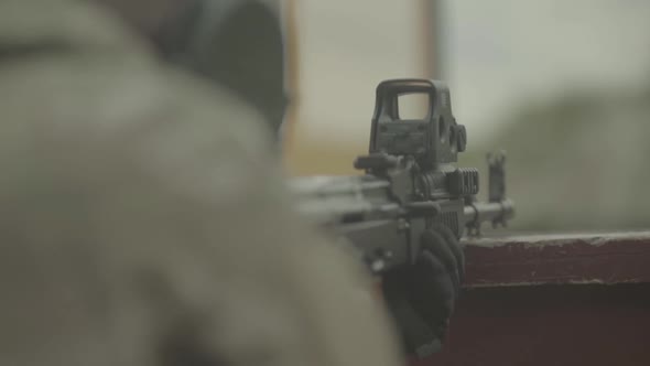 Rifle in the Hands of a Shooter During Shooting. Slow Motion. Close-up.