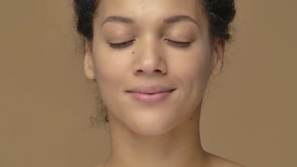 Beauty Portrait Young African American Woman is Relaxing Closing Eyes Calming Down and Breathing
