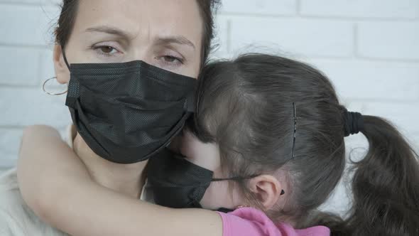 Mother with girl in quarantine.