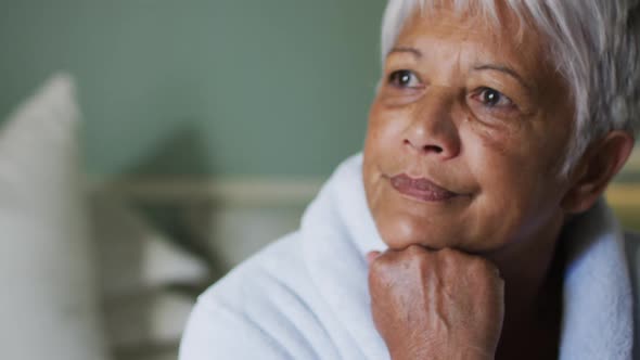 Close up of senior mixed race woman at home in thought