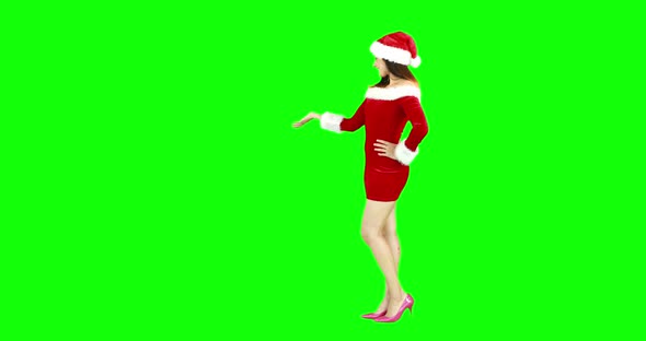 Pretty girl presenting in santa outfit 4k