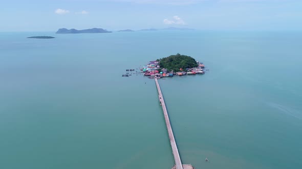 Drone camera flying over small bridge to the small island Located at Koh Rat suratthani Thailand