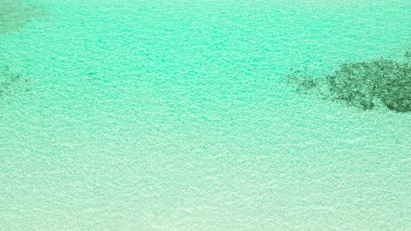 Sea Surface in a Turquoise Lagoon Top View