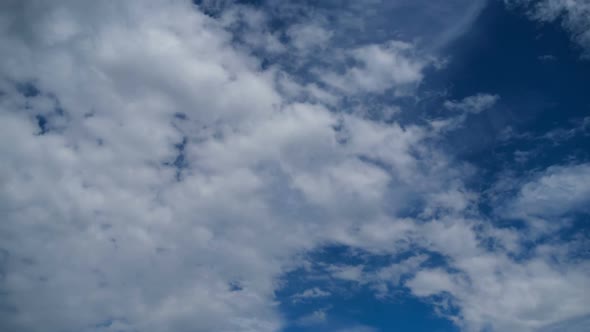 Clouds Move Smoothly in the Blue Sky. Timelapse