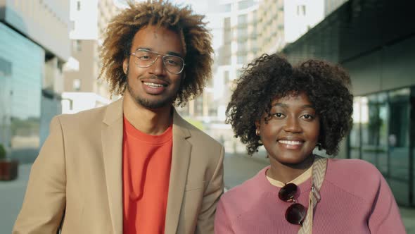 Portrait of Happy Afro Couple in City