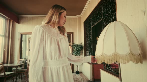 Woman in an old vintage Hotel