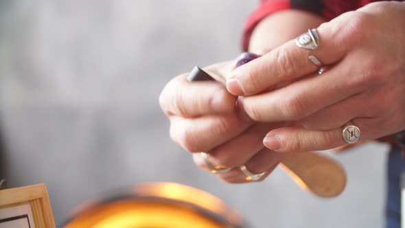 Jeweler Selecting Necessary Polishing Equipment.