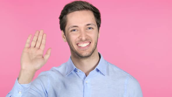 Hello, Waving Hand to Welcome on Pink Background