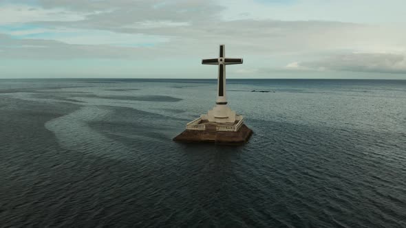 Sunken Cemetery Cross in Camiguin Island Philippines