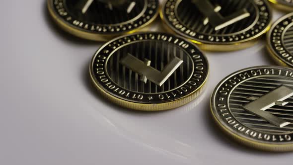 Rotating shot of Litecoin Bitcoins (digital cryptocurrency) - BITCOIN LITECOIN 0007