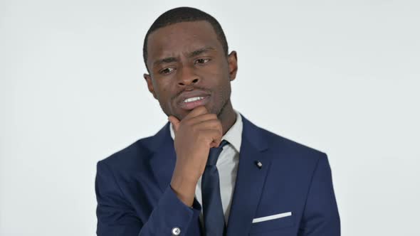 Pensive African Businessman Thinking White Background