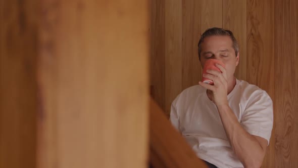 Man sitting on the stairs at home