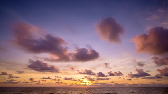 Time lapse colorful clouds over sea,Amazing sunset or sunrise sky landscape Dramatic light of nature alt