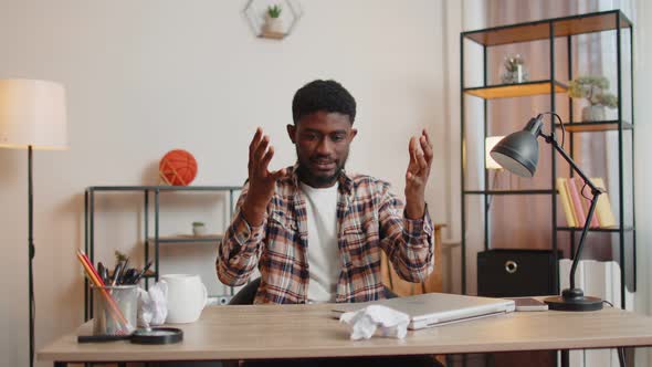 Angry Furious Man Working at Home Office Throwing Crumpled Paper Having Nervous Breakdown at Work