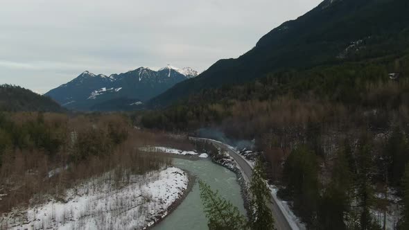 Aerial View of Chilliwack River with Snow During Winter Season