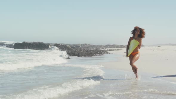 African American couple ready to go surf