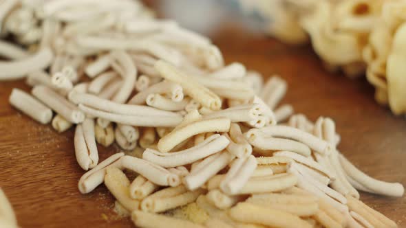 Home Made Pasta on the Table with Flour