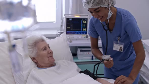 Nurse Taking Patient Blood Pressure