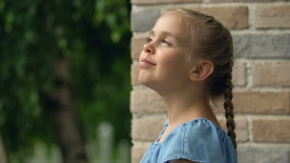 Happy Female Child Looking Around Standing Outdoor House Balcony, Nature Rest