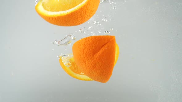 Orange Slices Falling into Water 21