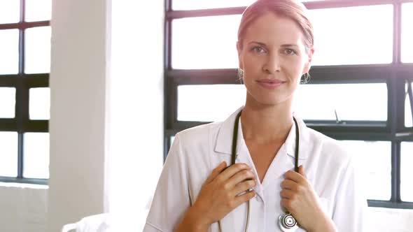 Female doctor smiling at camera