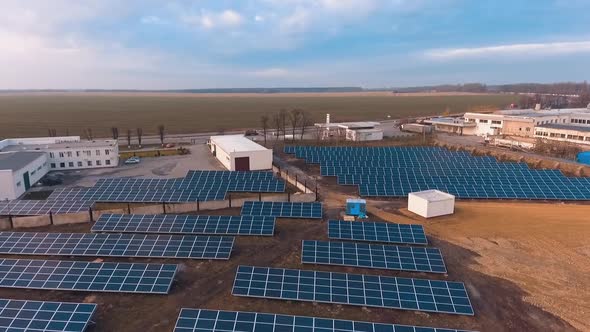 Solar panels for production of electricity. Drone shot of green electricity produced by solar panels